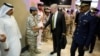 FILE - U.S. Defense Secretary James Mattis, center, is greeted by military dignitaries as he arrives at Al-Udeid Air Base in Doha, Qatar, April 21, 2017.