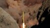 In this photo obtained from the Iranian Fars News Agency, a Qadr H long-range ballistic surface-to-surface missile is fired by Iran's Revolutionary Guard, during a maneuver, in an undisclosed location in Iran, Wednesday, March 9, 2016.
