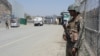 Pakistani soldiers patrol at the Torkham border crossing between Pakistan and Afghanistan in Pakistan's Khyber Pass, June 14, 2016. Both sides are blaming each other for a recent spike in tensions at the frontier.