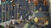 Indian army soldiers ride on T-72 tanks during the main Republic Day parade in New Delhi, January 26, 2012. 