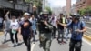 A Venezuelan National Guard joins anti-government protesters in a march showing support for opposition leader Juan Guaido in Caracas, Venezuela April 30, 2019.