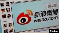 Logo of Sina Corp's Chinese microblogging site, "Weibo," on a screen, Beijing, September 2011.