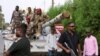 Sudan's military ruler Burhan arrives to the city of Port Sudan on his first trip away following the crisis in Sudan capital Khartoum