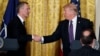 President Donald Trump shakes hands with NATO Secretary General Jens Stoltenberg during a news conference in the East Room of the White House, April 12, 2017, in Washington. 