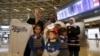 FILE - U.S Ambassador to Jordan Alice Wells poses with the family of Syrian refugee Ahmad al Aboud at the Queen Alia International Airport in Amman, Jordan, April 6, 2016. The family was headed for resettlement in the United States.