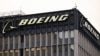 FILE - The Boeing Co. logo is displayed outside of company offices near Los Angeles International Airport (LAX) in El Segundo, California, Jan. 18, 2024. New CEO Kelly Ortberg laid out his plan to turn Boeing around after years of heavy losses and damage to its reputation.  