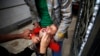 A boy receives a polio vaccination during a polio immunization campaign in Sana'a, Yemen, Aug. 15, 2015.