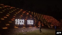 Вшанування жертв Голодомору в Україні, Київ, 25 листопада 2023. Roman PILIPEY / AFP