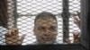 FILE - Mohammed Badr, a cameraman for Al-Jazeera Mubasher Misr, shown in a Cairo court.