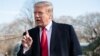 FILE - U.S. President Donald Trump speaks to the media prior to departing on Marine One from the South Lawn of the White House in Washington, March 28, 2019.