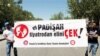 Protestors carry banner that reads "O Sultan, take your hands off theaters," May Day rally, Ankara, Turkey, May 1, 2012.