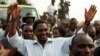Hakainde Hichilema, United Democratic Alliance (UDA) leader and presidential candidate for Zambia's upcoming elections, greets his supporters at Zingalume compound in Lusaka, September 26, 2006. 