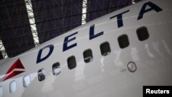 A Delta Airlines aeroplane is seen inside of a hangar in Mexico City, Mexico, May 3, 2017. 