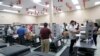 Employees at the Broward County Supervisor of Elections office count ballots during a recount in Lauderhill, Florida, Nov. 14, 2018.